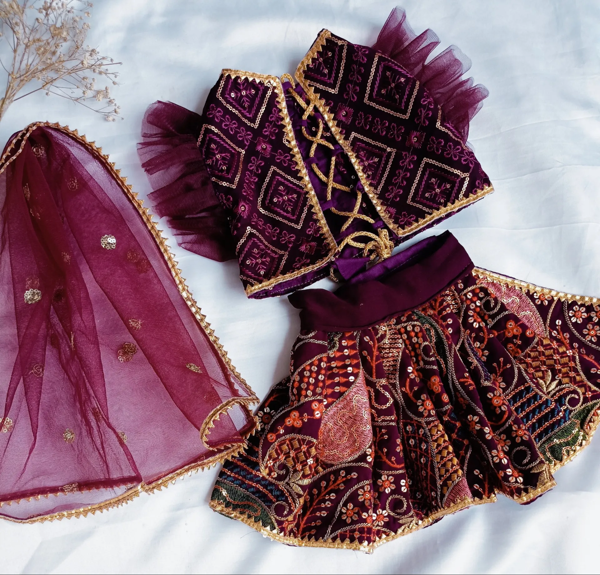 Wine color Heavy work embroidered lehenga choli with dupatta